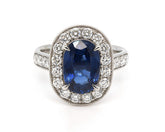Oval-Cut Blue Sapphire Halo Ring
