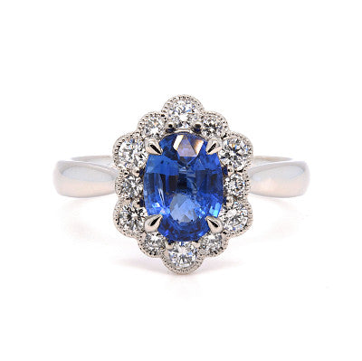 Blue Sapphire Oval cut with diamond Halo and diamond shoulders
