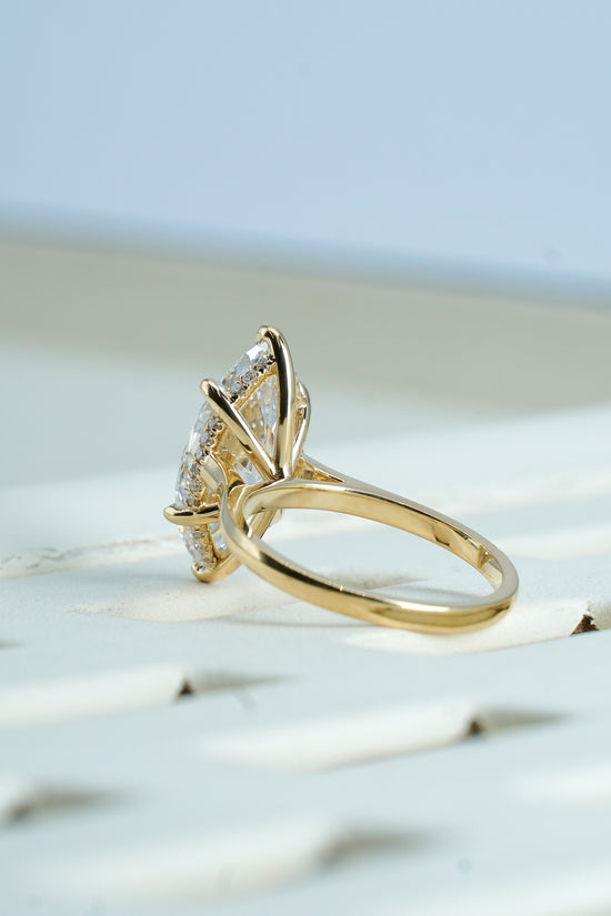 Bellla 3 ct  Marquise solitaire in 18k yellow  gold with hidden halo
