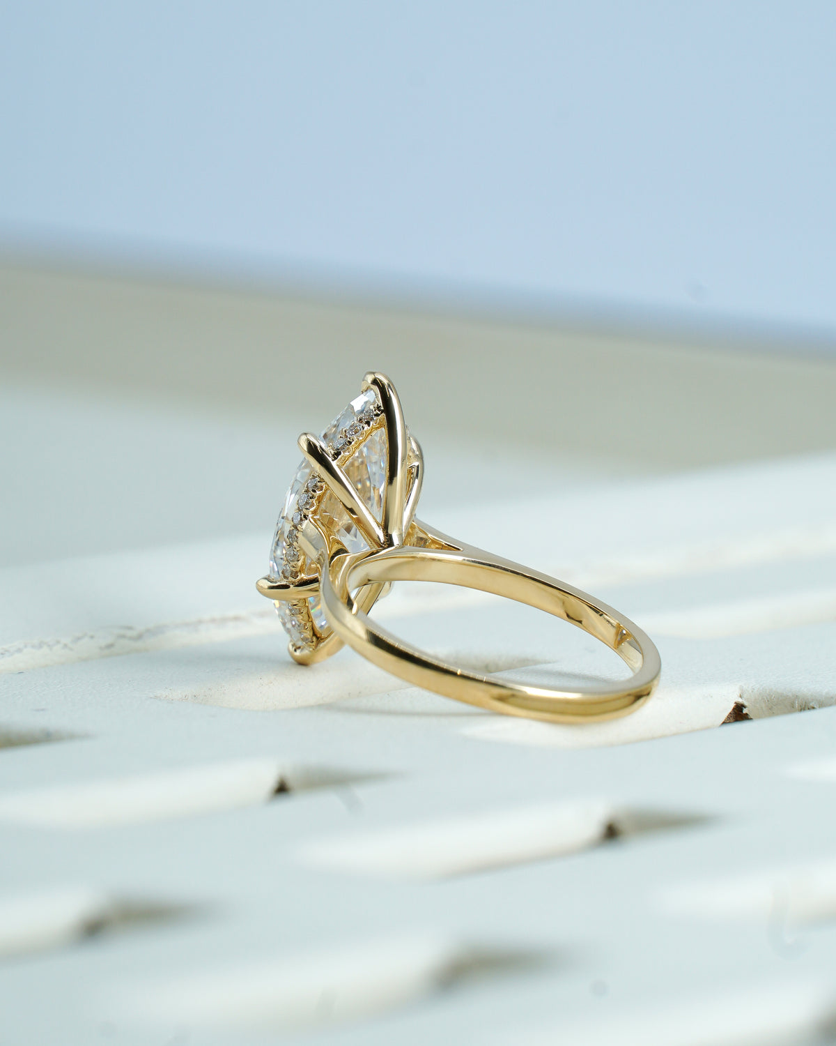 Bellla 3 ct  Marquise solitaire in 18k yellow  gold with hidden halo