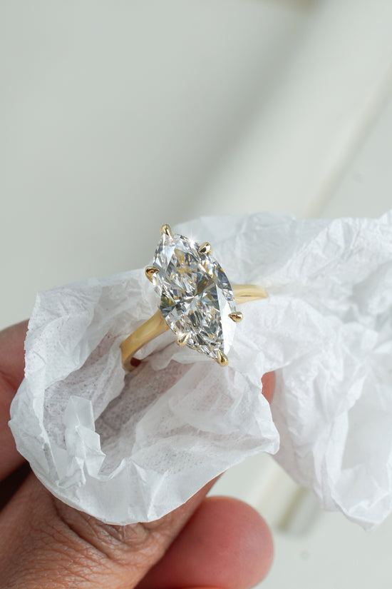 Bellla 3 ct  Marquise solitaire in 18k yellow  gold with hidden halo