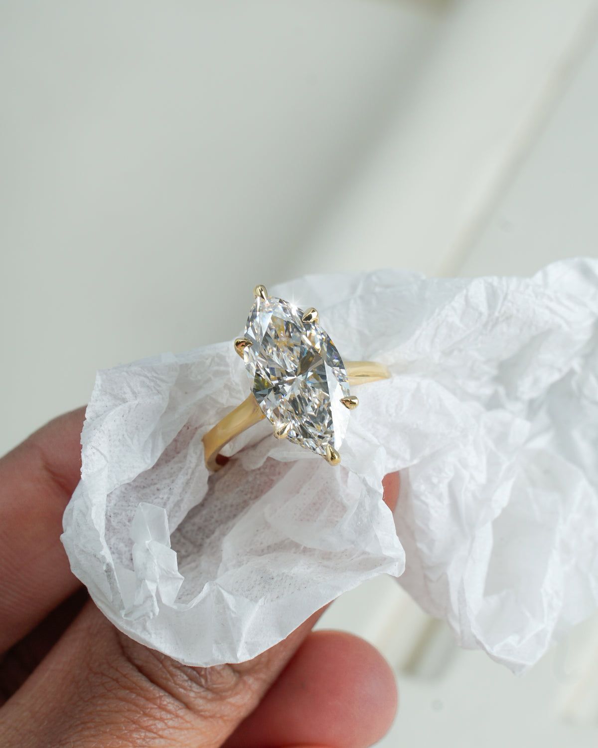 Bellla 3 ct  Marquise solitaire in 18k yellow  gold with hidden halo