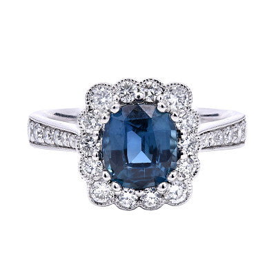 Teal Sapphire oval brilliant cut with Halo and diamond shoulders