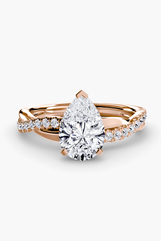 The Emerald Twist Pavé Ring