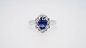 Blue Sapphire Oval cut with diamond Halo and diamond shoulders