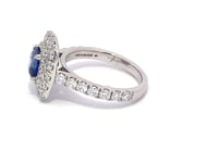 Blue Sapphire cushion cut with double Halo cluster shoulder diamonds
