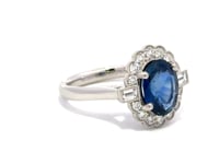 Blue Sapphire Halo Diamonds with Mill Grain Edges and Baguettes Sides