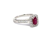 Ruby radiant cut with diamond Halo and diamond shoulders